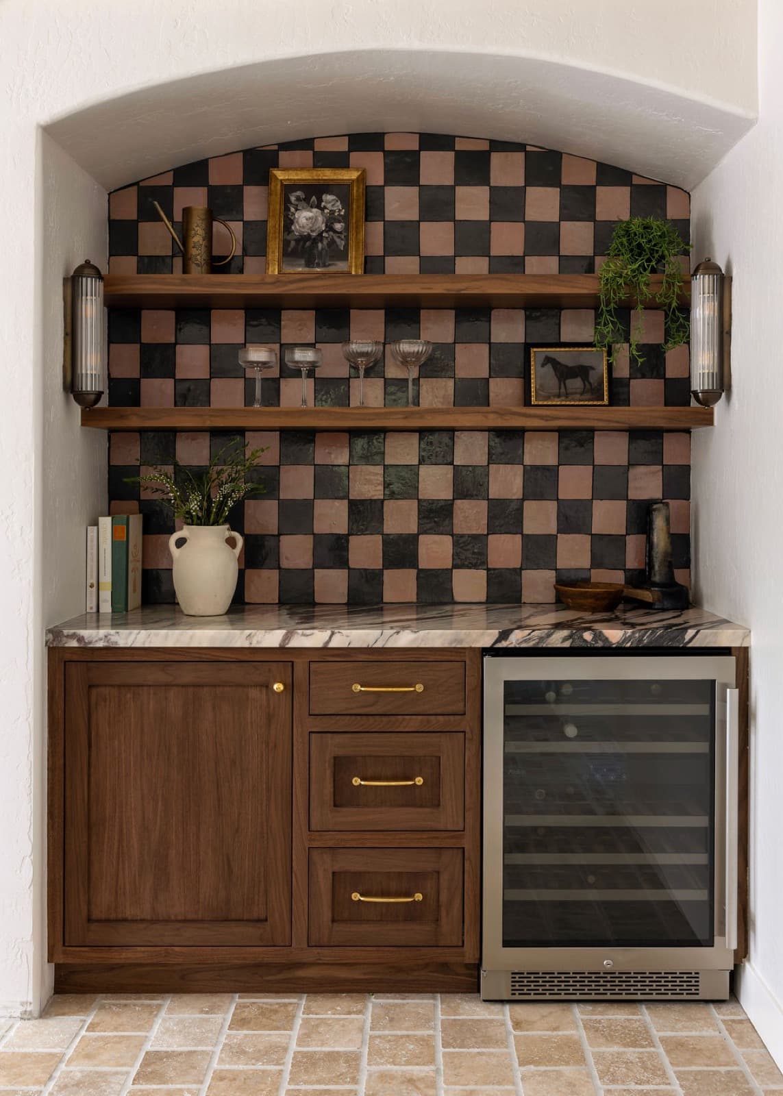 Warm walnut, checkerboard tile, and an arched opening in a Barcci kitchen